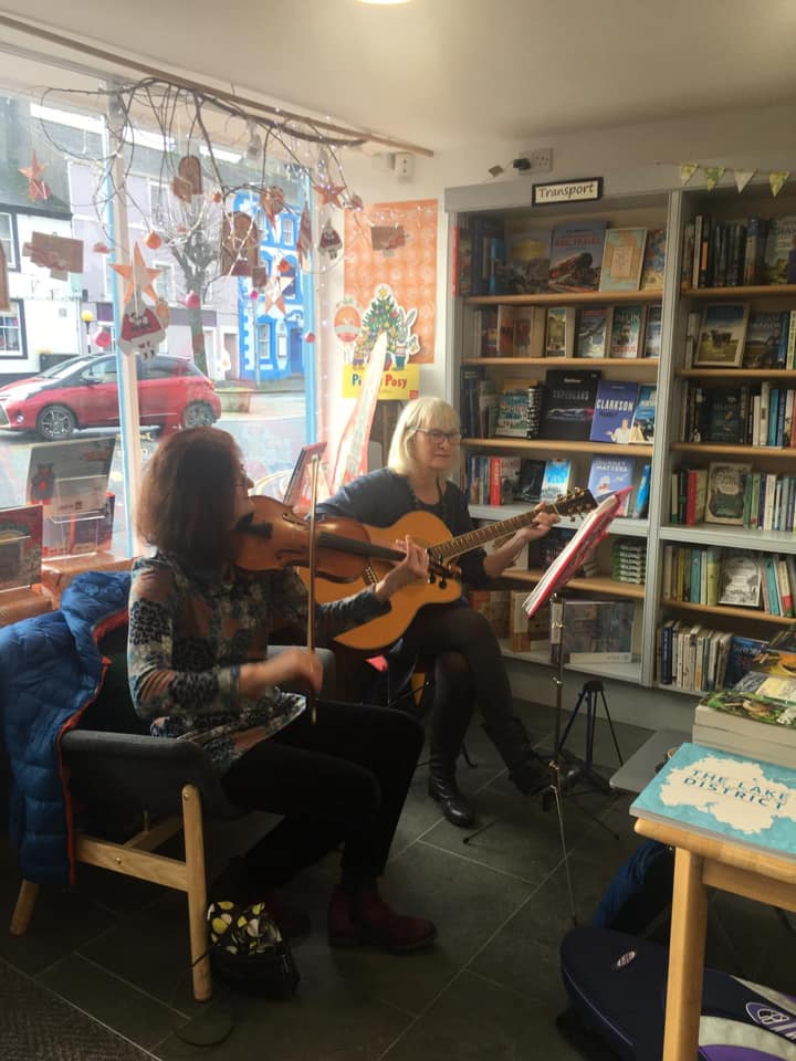Musicians in the bookshop
